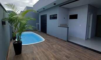 Imagem 2: Casa com 3 dormitórios sendo uma suíte, com piscina.