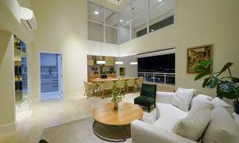 Imagem 2: Apartamento moderno com pé-direito duplo no living e varanda e vista para a cidade