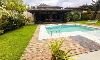 Imagem 3: Linda casa em condomínio com 4 suítes, varanda com espaço gourmet e piscina, na praia Dura