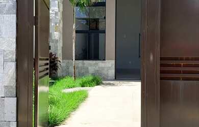 Imagem: Casa Veiga jardim ao lado do terminal