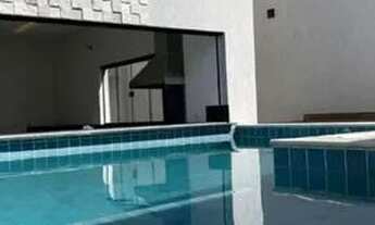 Imagem 4: Imponente sobrado com 3 suítes plenas, ampla sala e uma bela piscina elevada