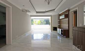 Imagem 3: Amplo apartamento semi mobiliado no Menino Deus. São 122m2, três quartos, 2 vagas