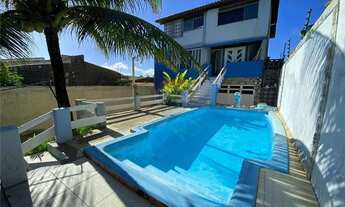 Imagem 2: Quer tranquilidade e conforto? Venha financiar esta linda casa em Praia da Costa com 5/4 e