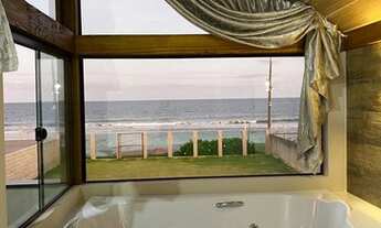 Imagem 2: Alugo Chalé de frente para o MAR, literalmente "PÉ NA AREIA"