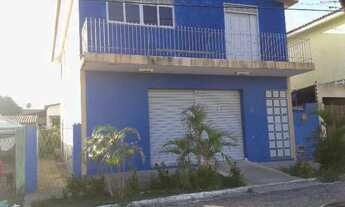 Imagem: Ponto comercial com uma casa no pavimento