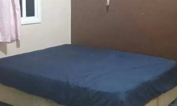 Imagem 7: Uma casa aconchegante situada num bairro residencial..