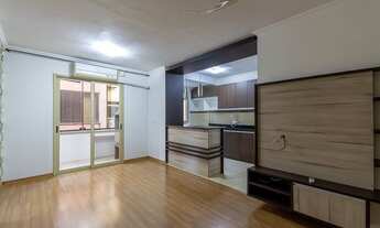 Imagem 2: Apartamento com sacada churrasqueira e garagem coberta