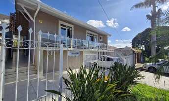 Imagem 2: Casa com 4 dormitórios à venda, 250 m² com edícula por R$ 990.000 - Bairro Alto - Curitiba