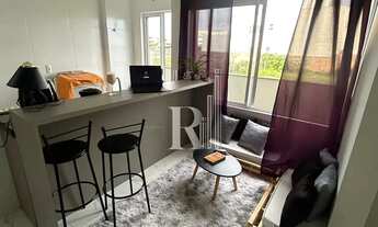 Imagem 5: Apartamento semi mobiliado para assumir financiamento com 02 dormitórios, cozinha com ilha