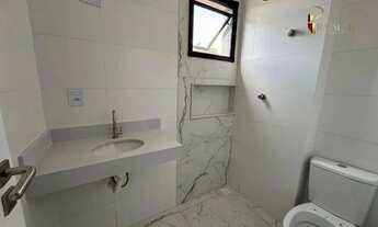 Imagem 3: Apartamento com 2 dormitórios sendo 2 suítes com churrasqueira à carvão no canto do forte