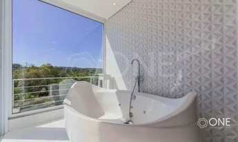 Imagem 7: Casa para venda possui 100 metros quadrados com 3 quartos em Riviera - Bertioga - SP