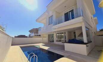 Imagem 2: Casa com 4 dormitórios para alugar, 468 m² por R$ 23.835,22 - Alphaville - Santana de Parn