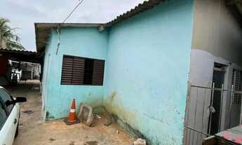 Imagem 3: Terreno com uma casa e uma edícula nos fundos