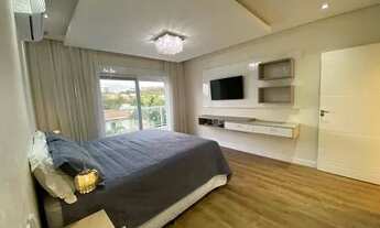 Imagem 5: Casa de condomínio para venda tem 385 metros quadrados com 4 quartos