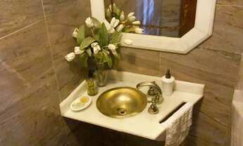 Imagem 6: Casa de condomínio para venda possui 380 metros quadrados com 3 quartos