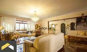 Imagem 2: Casa com 3 dormitórios para alugar por R$ 15.400/mês - Jardim Lindóia - Porto Alegre/RS