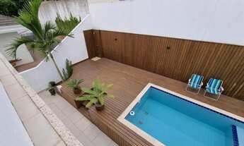 Imagem 4: Casa Alto Padrão na Pedra Branca - Sofisticação, Piscina e Localização Privilegiada