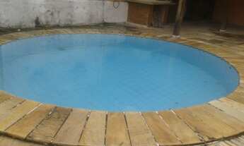 Imagem 3: Excelente casa em centro de terreno com piscina