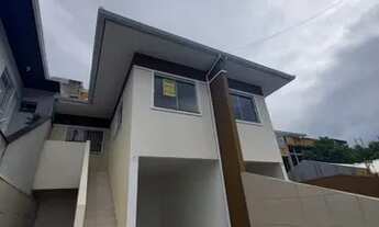 Imagem 6: Casa com garagem coberta