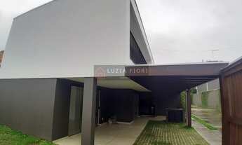 Imagem 2: SAGUAÇU - GEMINADO EM CONDOMÍNIO FECHADO , COM AMPLO TERRENO NA LATERAL E NOS FUND