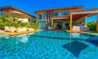 Imagem 2: Casa de condomínio para aluguel de temporada e venda tem 570 metros quadrados com 5 suite