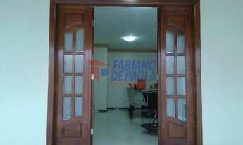 Imagem 6: Casa com quartos espaçosos e excelente área externa