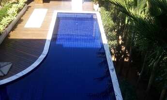 Imagem 4: Casa de condomínio para venda tem 1000 metros quadrados com 6 quartos