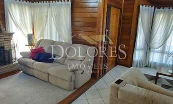 Imagem 3: Casa de madeira no Aruã com 3 suítes