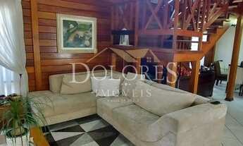 Imagem 2: Casa de madeira no Aruã com 3 suítes