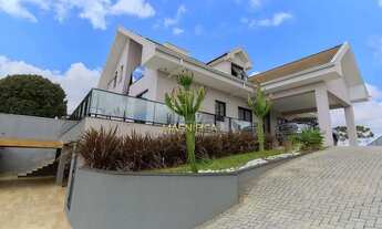 Imagem 4: Casa em Santa Felicidade Se você busca conforto, sofisticação e contato com a natureza, es