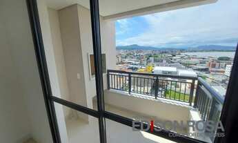 Imagem 3: Apartamento 2 quartos, sendo 1 suíte, sacada com churrasqueira, garagem coberta no bairro