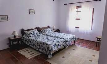 Imagem 2: Chácara para venda possui 210 metros quadrados com 4 quartos