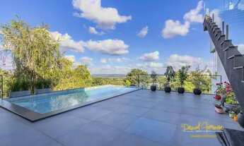 Imagem 5: Casa com 4 quartos, sendo 3 suítes em 590 m² em um espaçoso terreno de 1.000 m²