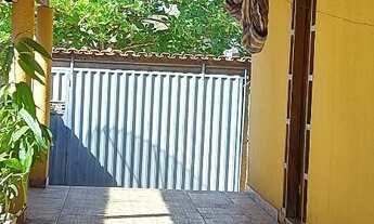 Imagem: Casa com um predinho nos fundos