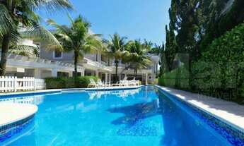 Imagem 2: Jardim Acapulco Guarujá, casa com amplo espaço de lazer