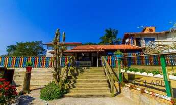 Imagem 6: Casa com 5 dormitórios (3 suítes) e 4 vagas de garagem no bairro Canasvieiras, em Florianó