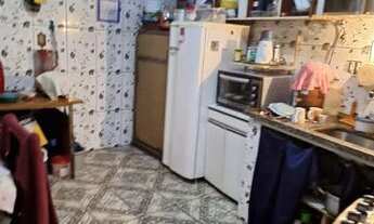 Imagem: Casa em comunidade de frente para a rua