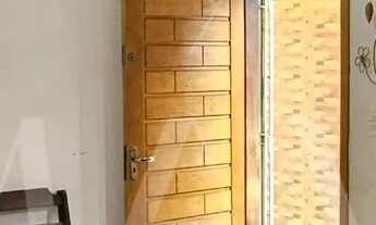 Imagem 2: Casa para venda de 2 dormitórios na quadra da praia no bairro Real, Praia Grande/SP