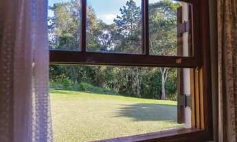 Imagem 3: Chácara para venda possui 210 metros quadrados com 4 quartos