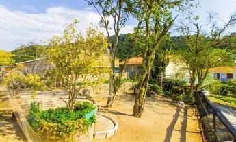 Imagem 7: Casa com 5 dormitórios (3 suítes) e 4 vagas de garagem no bairro Canasvieiras, em Florianó