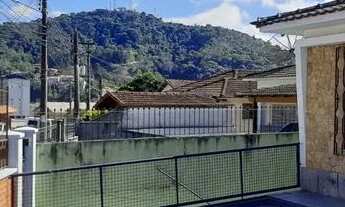 Imagem 2: Casa com 4 dormitórios para alugar, 277 m² por R$ 3.450,08/mês - Fazendinha - Teresópolis