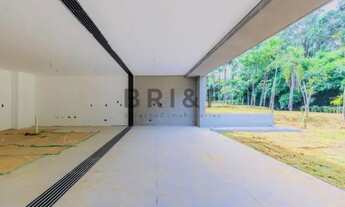 Imagem 3: Casa em condomínio com 4 suítes, jardim privativo com piscina na Granja Julieta