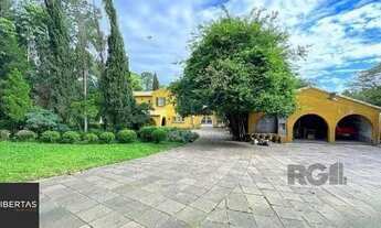 Imagem 4: Casa em Porto Alegre, no bairro Pedra Redonda, com 7 dormitório(s), e 7 banheiro