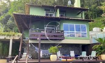 Imagem 2: Casa com vista espetacular, pés na areia em condomínio de Luxo em Angra dos Reis