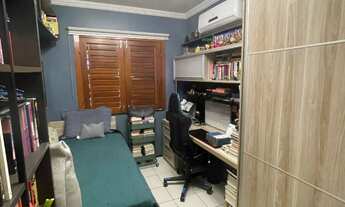 Imagem: Casa com dois quartos sendo um suíte em