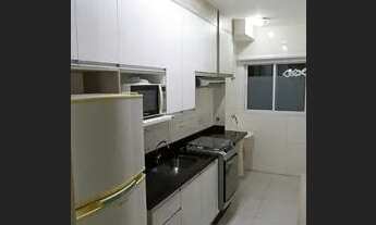 Imagem 2: Apartamento térreo com sacada ,planejados cozinha, cooketop e geladeira