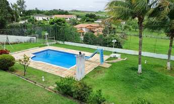 Imagem 7: Casa de condomínio para aluguel possui 420 metros quadrados com 6 quartos