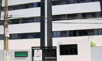 Imagem: Quarto e sala com vista para o mar da praia