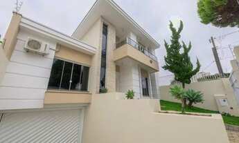 Imagem 2: Casa para venda com 430 metros quadrados com 5 quartos em Capão Raso - Curitiba - PR