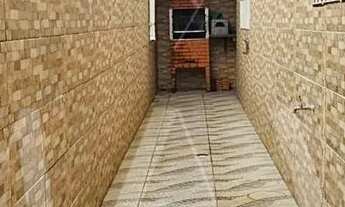 Imagem 7: Casa para venda de 2 dormitórios na quadra da praia no bairro Real, Praia Grande/SP